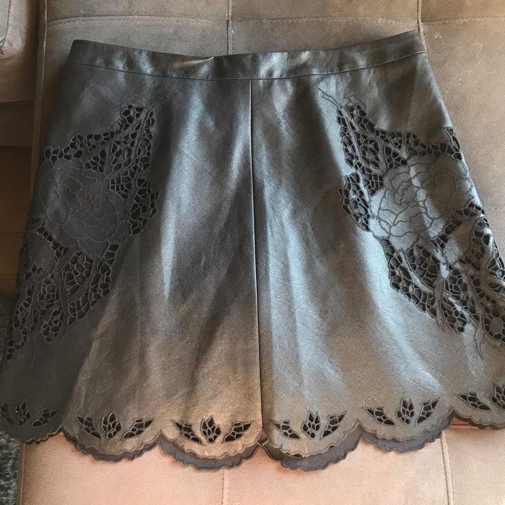 Never Worn Black Leather BCBG skirt. Size 6.
